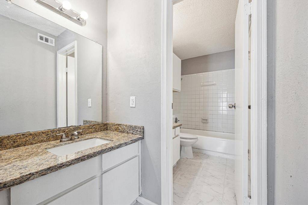 Full bath with double vanity