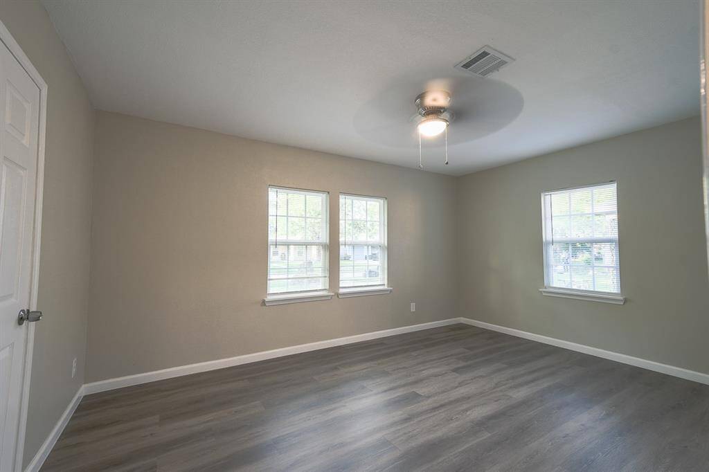 another view of the primary bedroom
