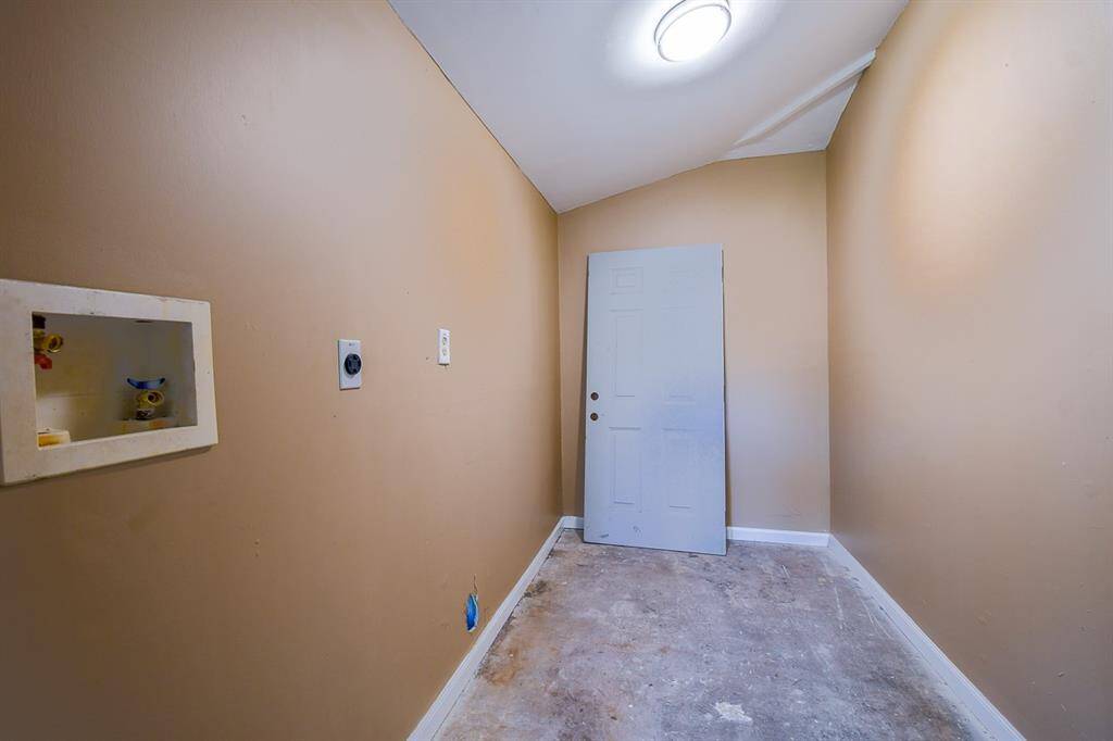 laundry room with washer and electric dryer connections
