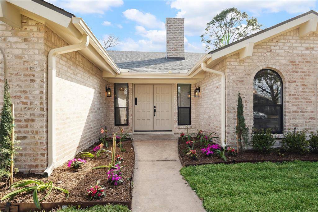 Inviting entryway with a stylish front door.