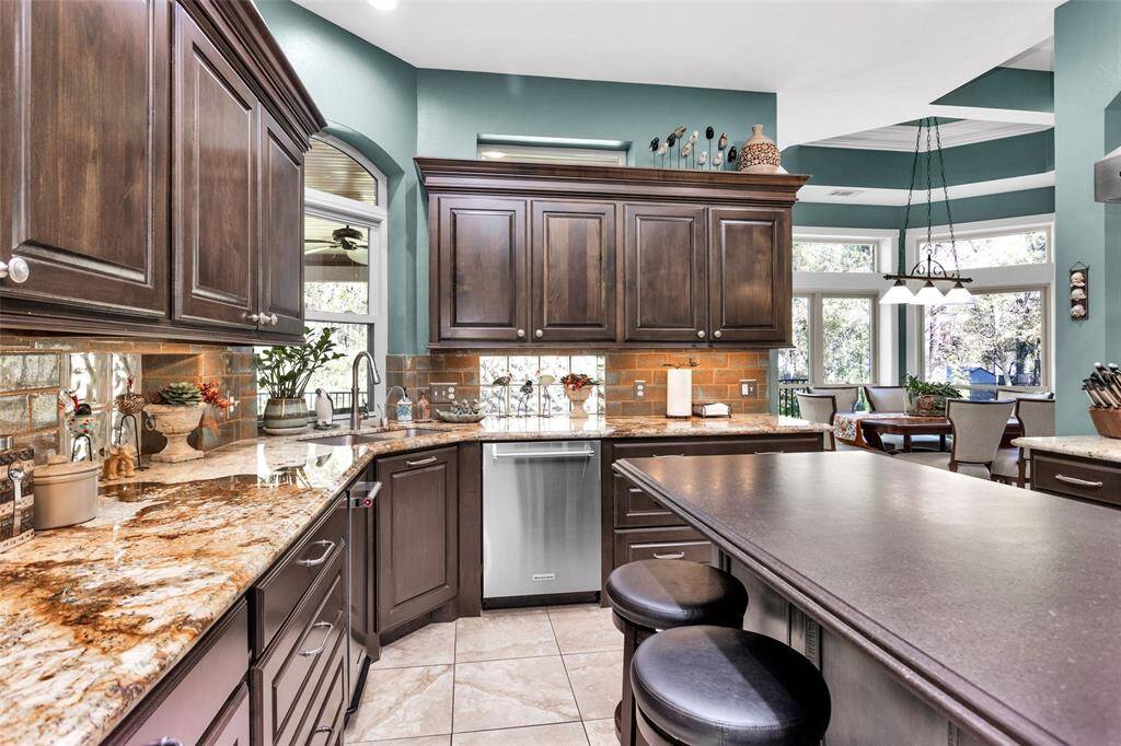 Island with leathered granite counter