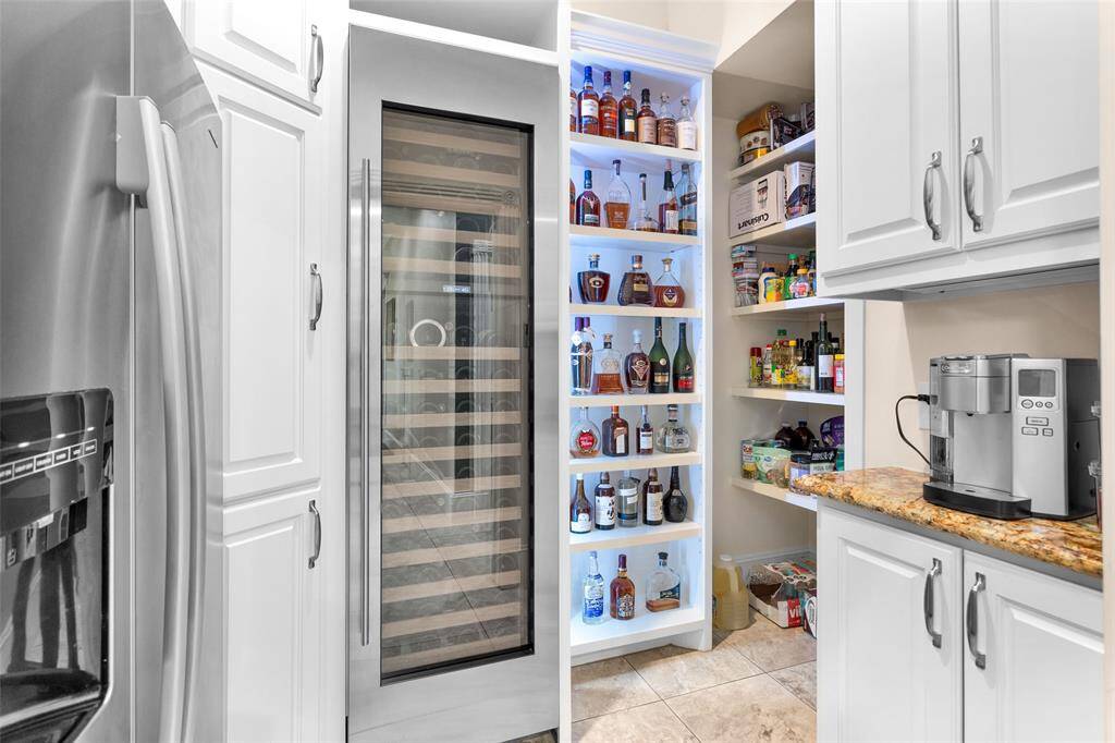 Wine room with Subzero cooler & 2nd refrigerator included