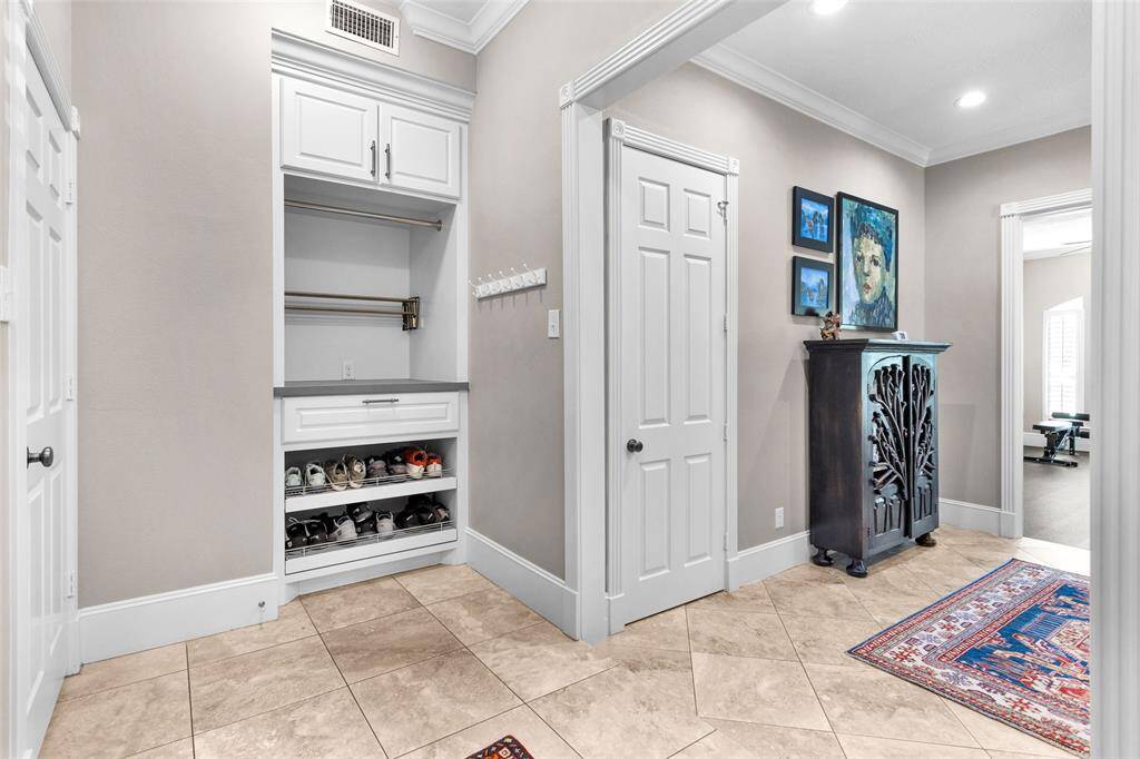 2nd walk-in pantry and built-ins in utility/craft area