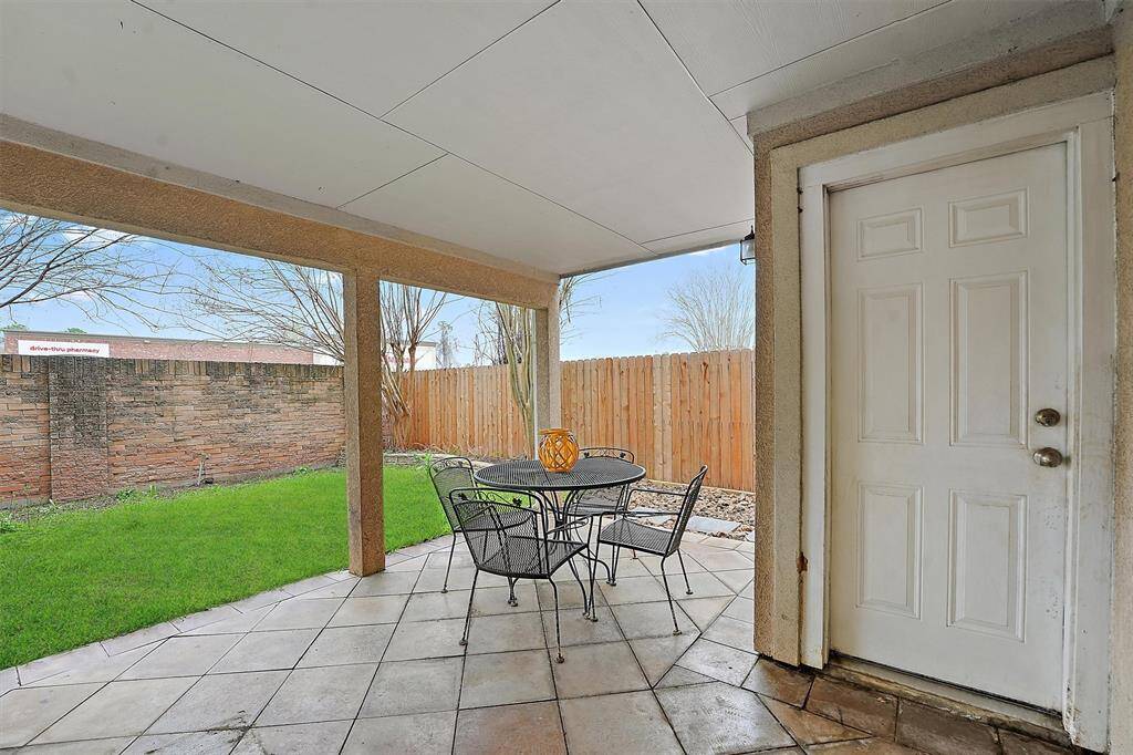 Located right off the first level entryway, is the perfect outdoor space. Lovely sized patio and green space to make your own.