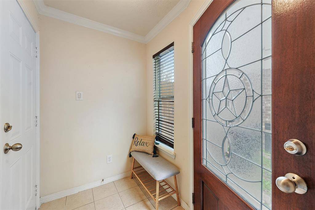 Whether you enter from the front door or the garage, you will step into a cute entryway before heading upstairs.