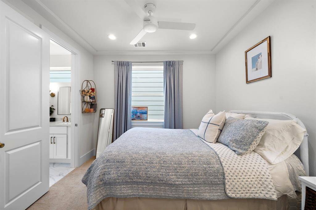 Sweet dreams in this cozy secondary bedroom.