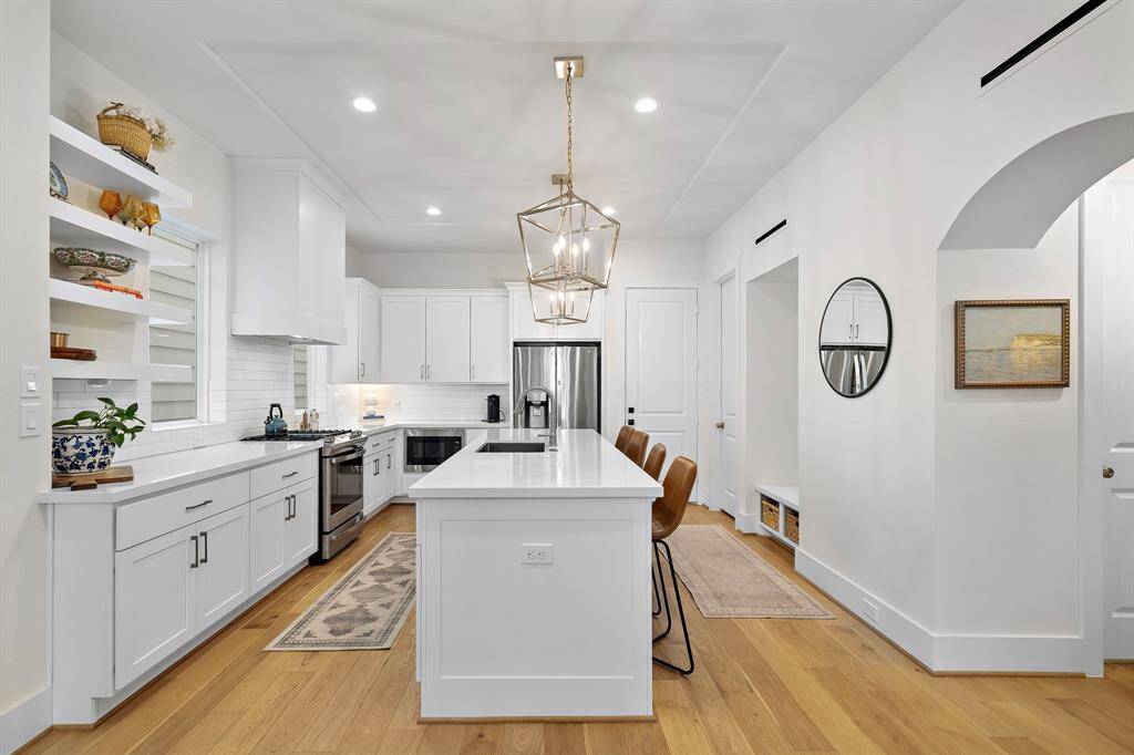 Island life: Gathering and creating in this beautiful kitchen.