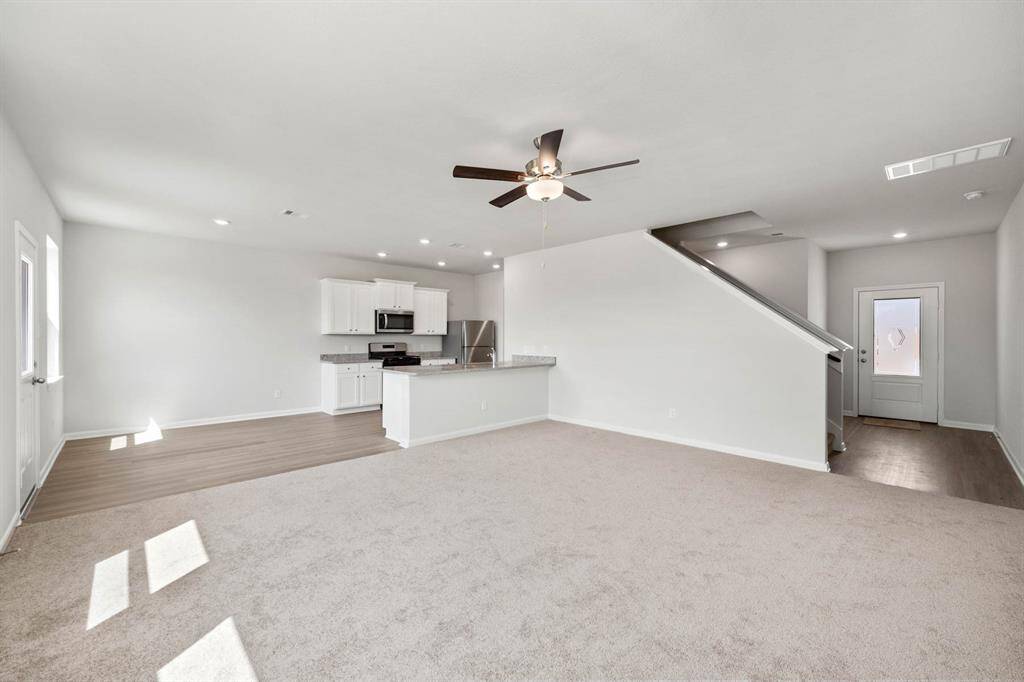 The spacious living room offers itself to host gatherings of any size.