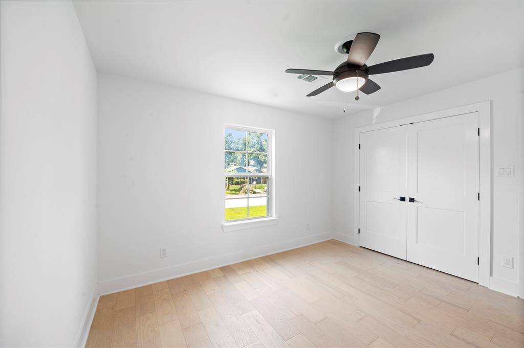 Another spacious bedroom with modern finishes and generous closet space—ideal for guests, kids, or your favorite hobby room.