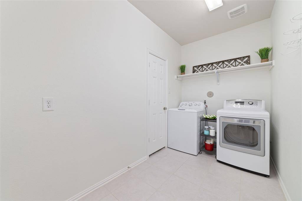 Large Laundry Room - access from hall or Primary Closet