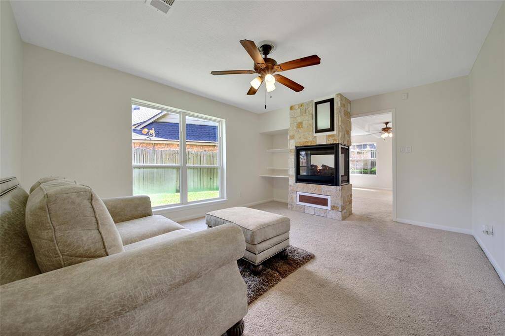 Primary suite with a relaxing sitting room to unwind.