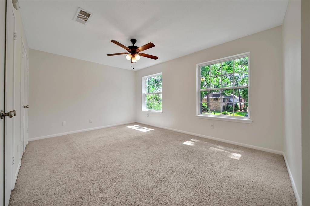 Light-filled upstairs bedroom, perfect for guests or family.