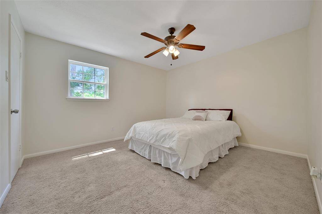 Upstairs bedroom with comfort and quiet in mind.