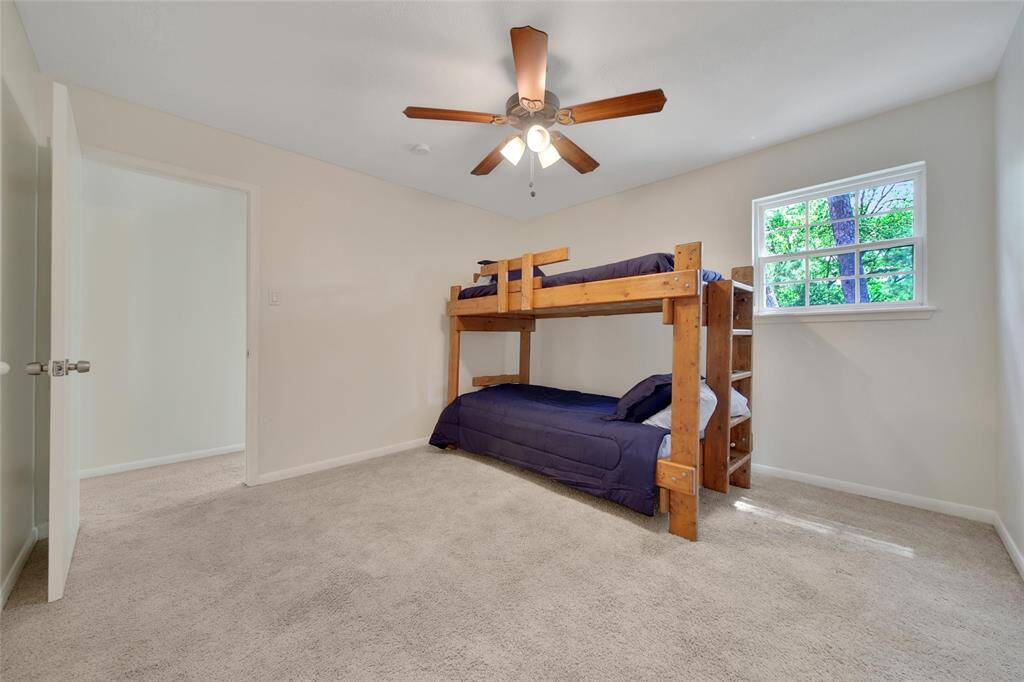 Comfortable upstairs bedroom with plenty of charm.