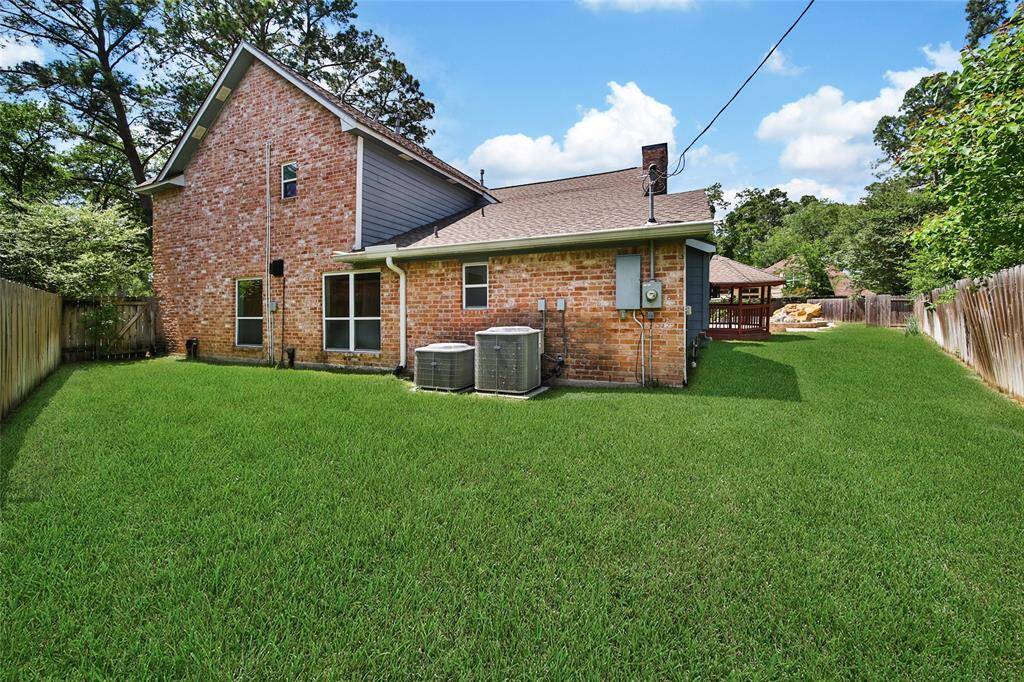 Dual ACs and a lush grassy yard!