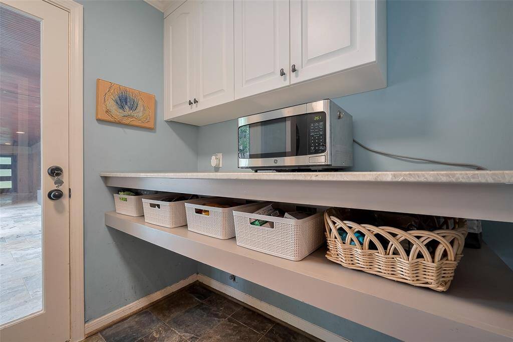 Mud room with half bath can easily be converted back to a laundry room
