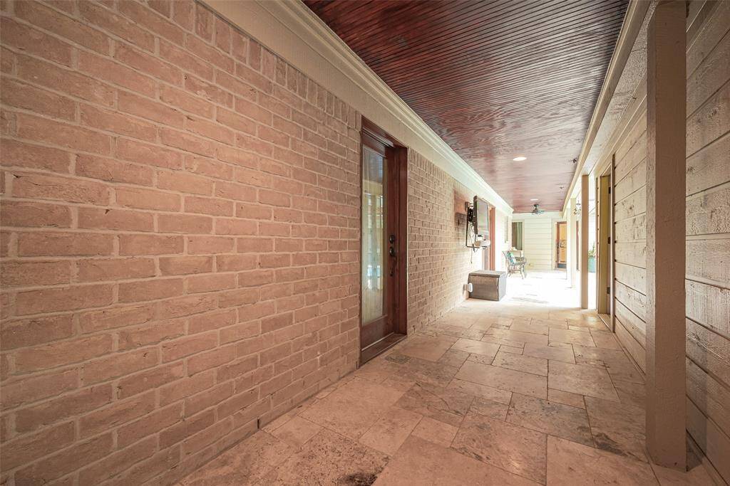 Private pathway leads to courtyard and actual entry to home