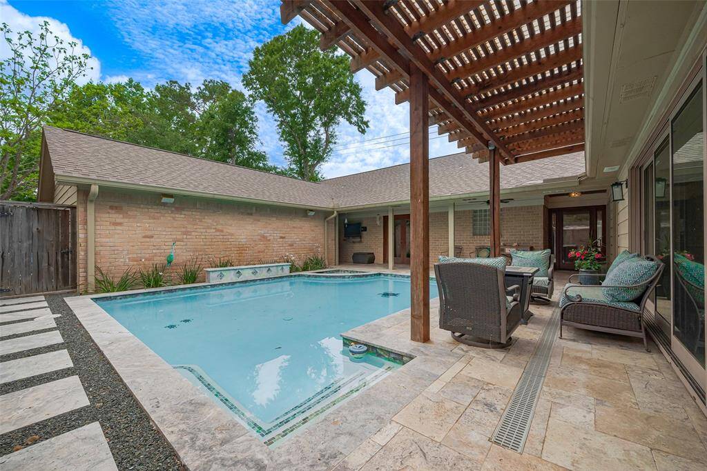 Updated pergola and pool decking
