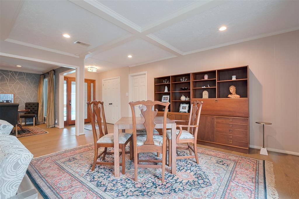 View of entry and dining from living area