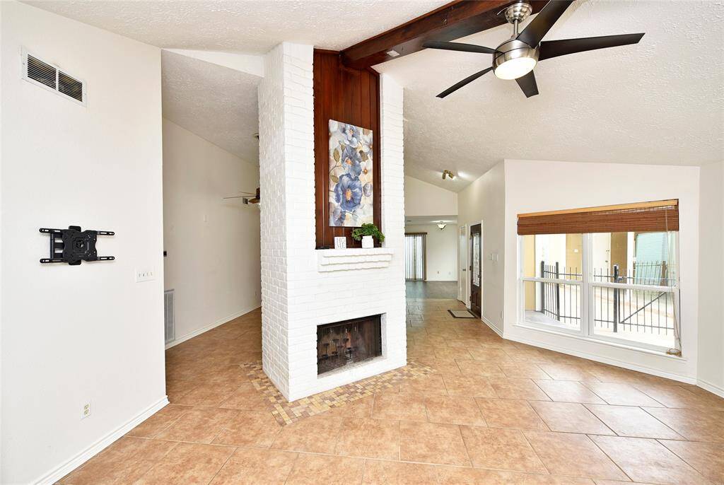 The largest flat screen tv will fit on this wall!