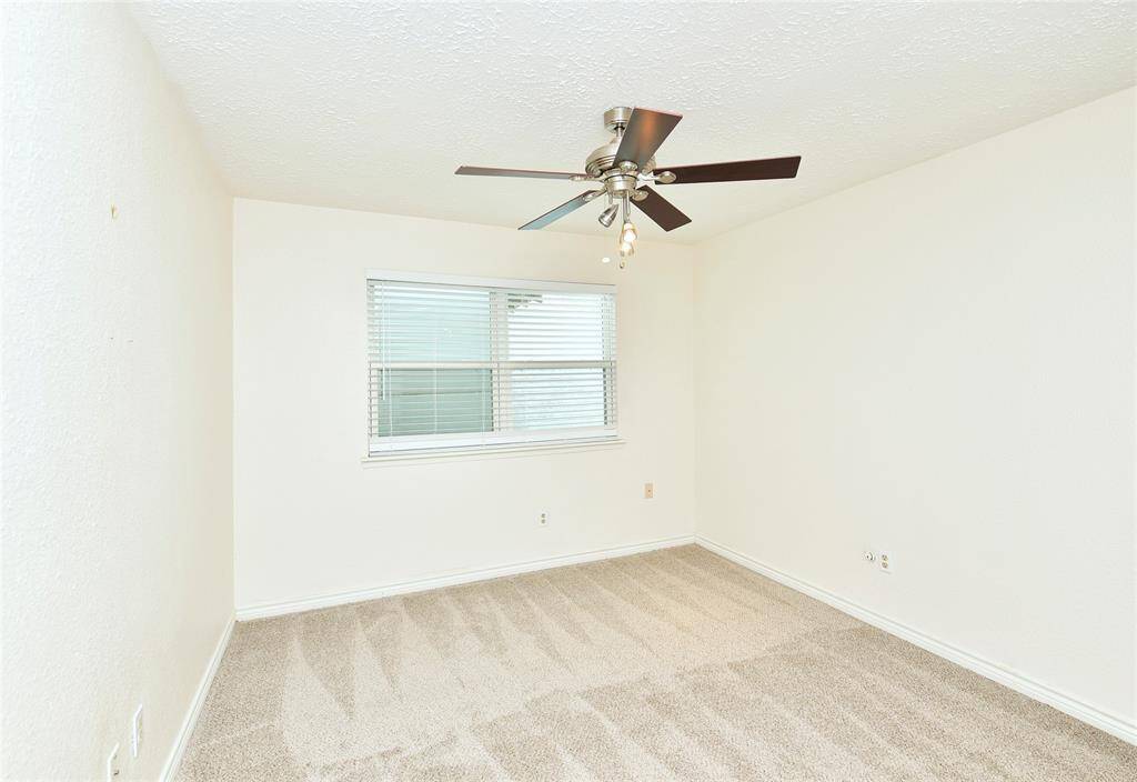 Bedroom 3 has a walk-in closet, ceiling fan, and new neutral carpet (April 2025).