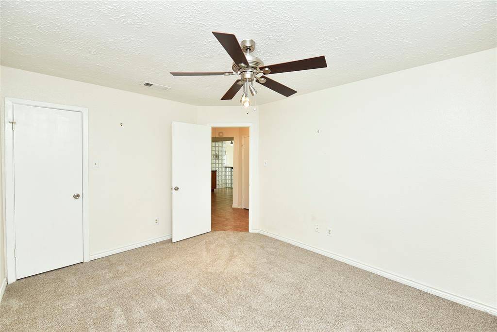 Bedroom 2 is generously sized and also has new carpet and a walk-in closet.