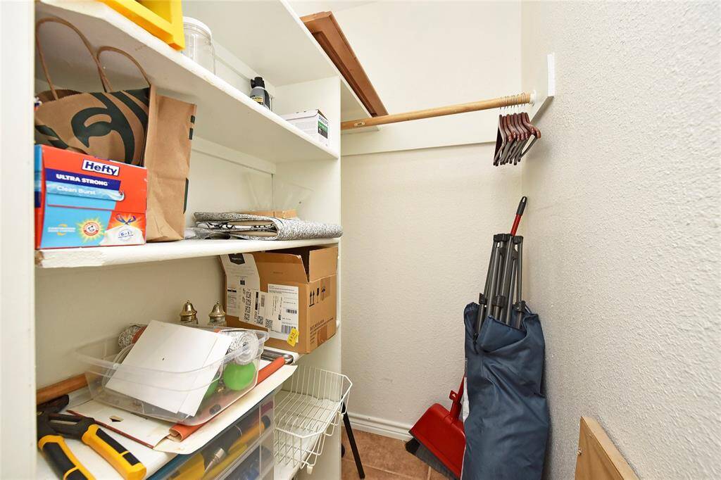 The front closet, as you enter the home, is perfect to corral not only coats and jackets, but all the other miscellaneous items that come in with you!