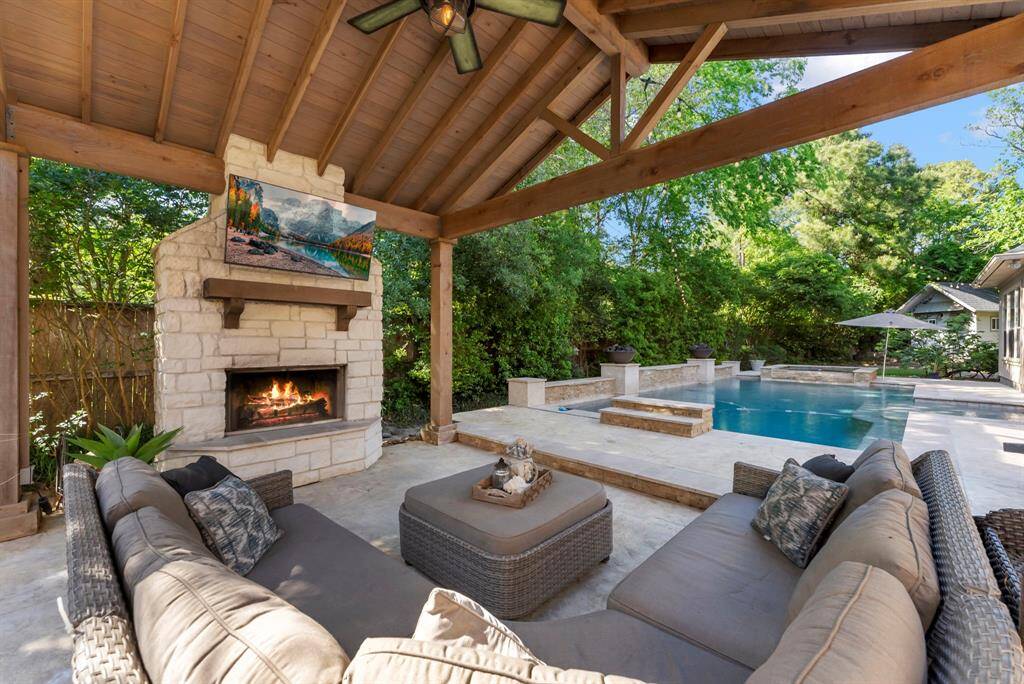 A spacious backyard offers plenty of room for lounging and enjoying the outdoors.