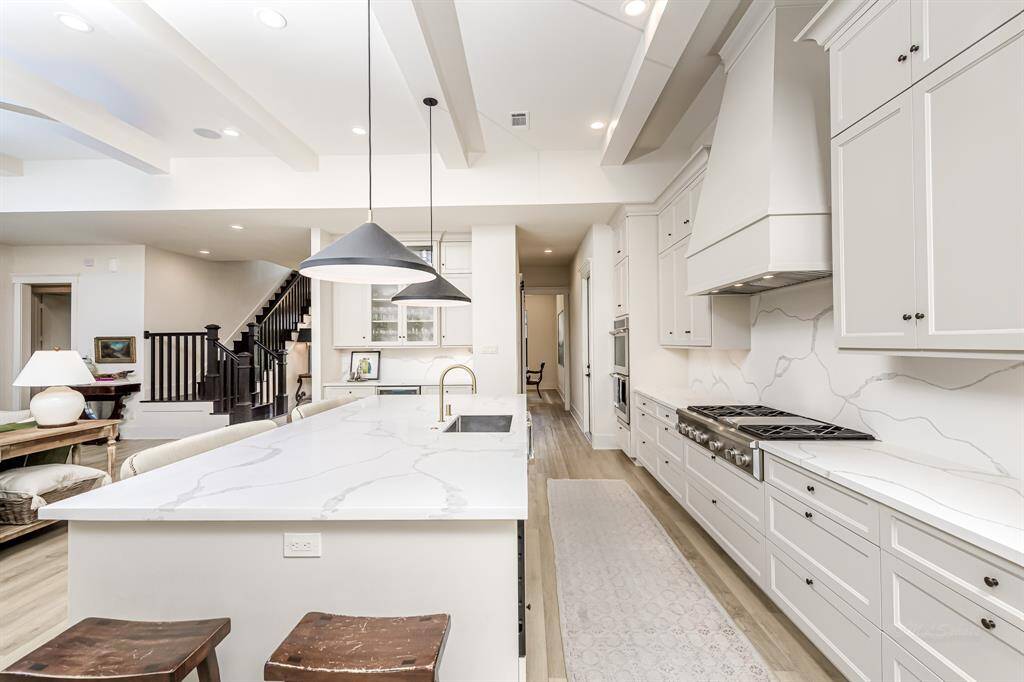 Every chef's dream kitchen with stunning pendant lighting