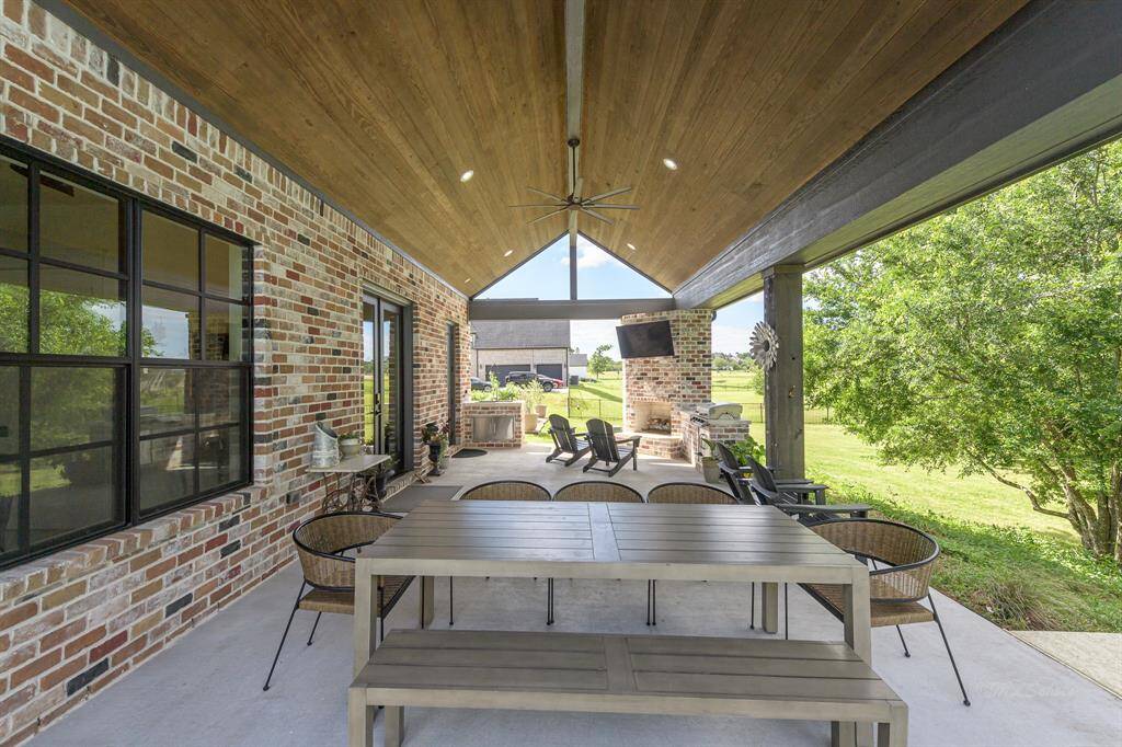 Enjoy all your outdoor living on this amazing covered patio with vaulted ceiling.