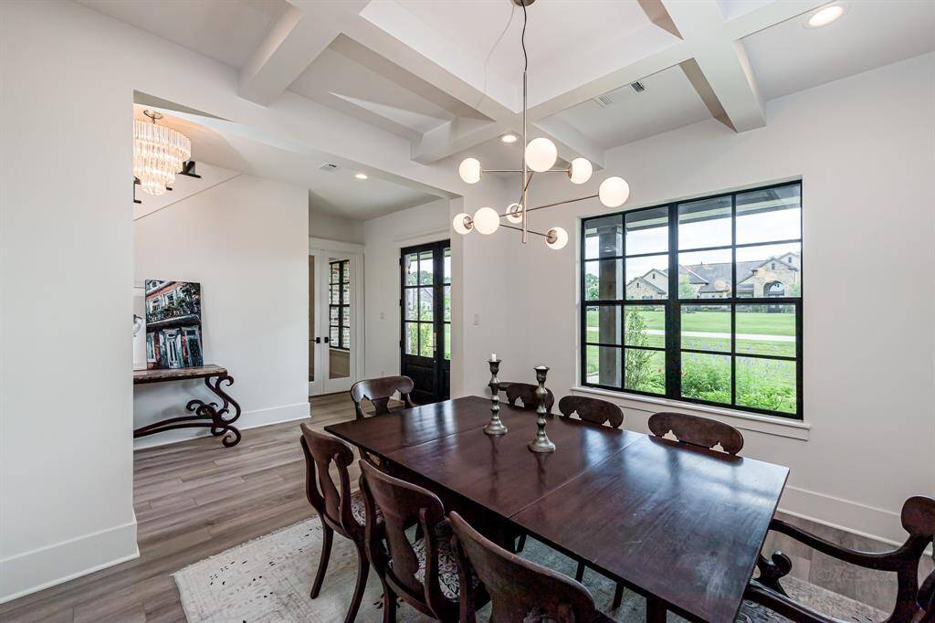 Formal dining room with gorgeous coffered ceiling