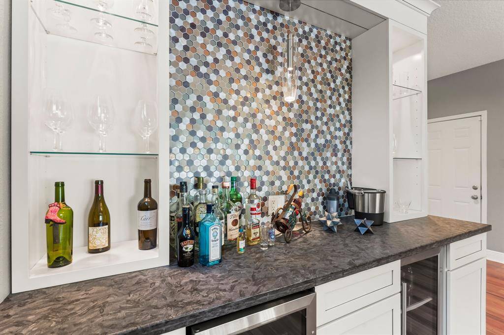Downstairs bar with wine and beverage refriderator