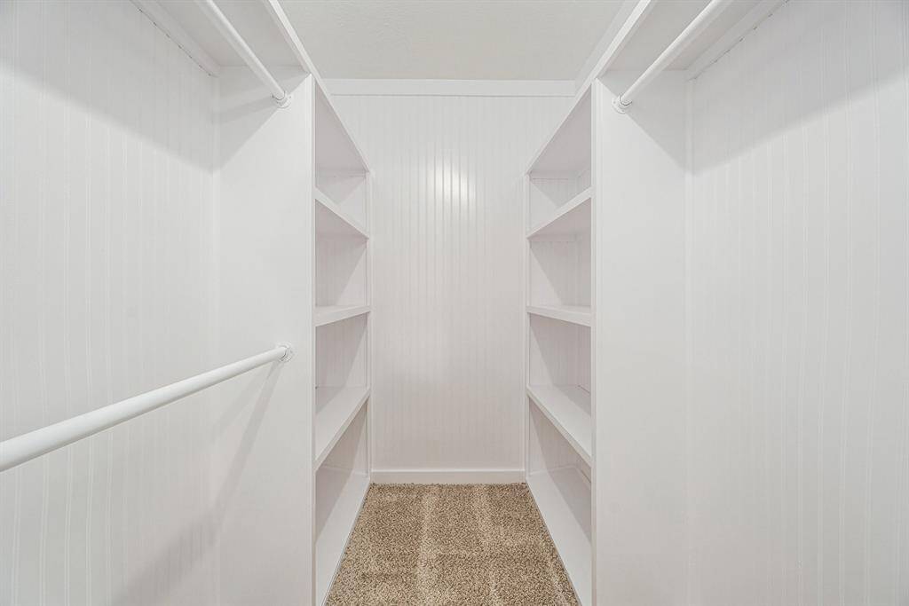 Look at all this space in the primary closet!