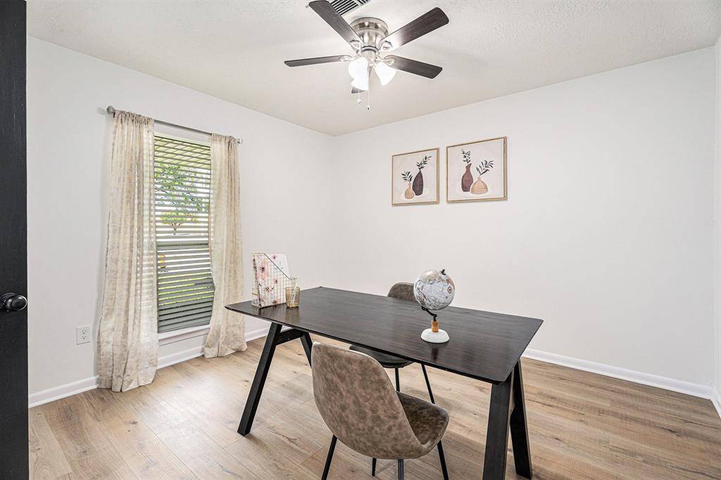 Nice study/bedroom with french doors/ceiling fan