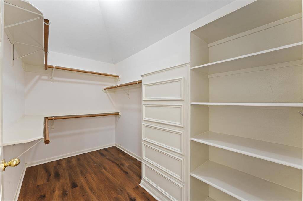Connected to a spacious walk-in closet, this bathroom combines luxury and practicality in one serene space.