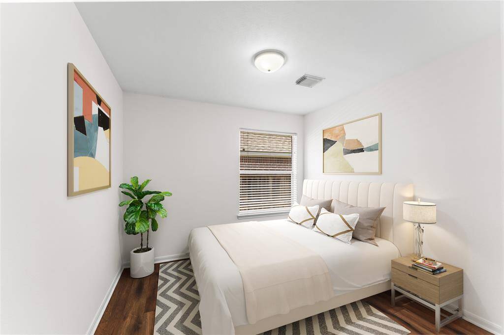 A bright and versatile space, this  third bedroom offers endless possibilities—whether for restful nights or productive days.