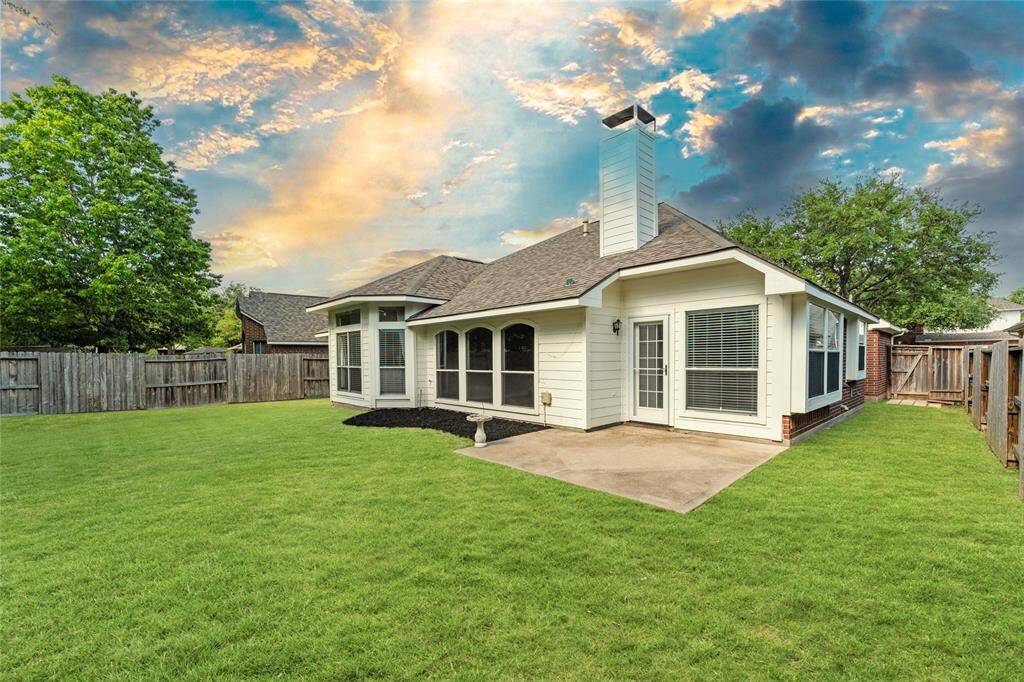 Step outside into the expansive backyard, a true haven for outdoor living.
