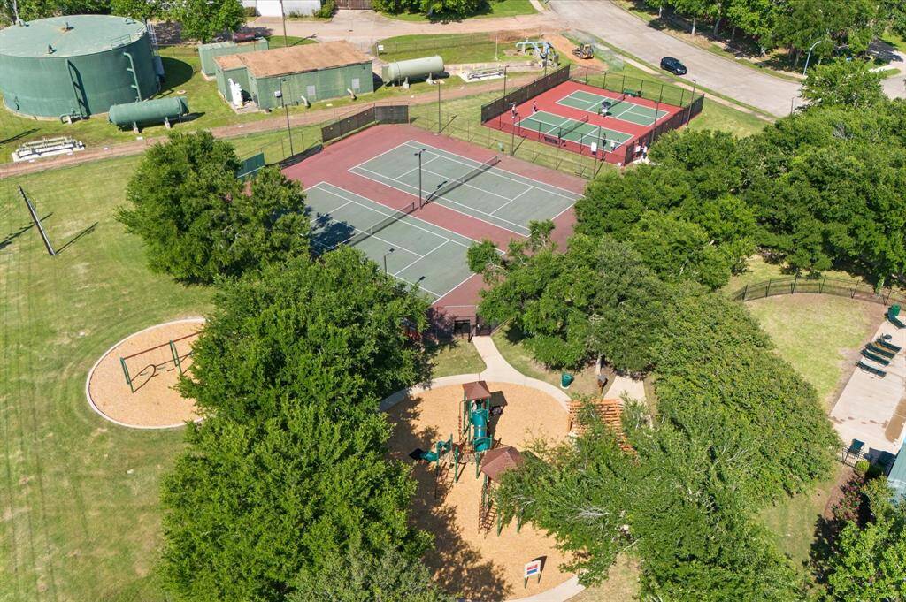 The tennis courts are great for friendly matches or staying active with neighbors. Well-maintained and welcoming, these amenities add to the charm and lifestyle of the neighborhood.