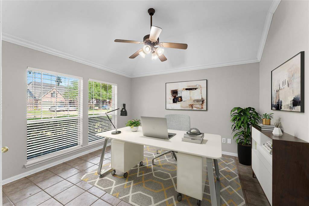 The study room offers a quiet escape from the hustle and bustle of everyday life. Large windows let in the soft natural light, creating a peaceful work environment.