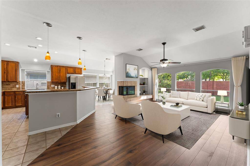 The open layout creates a seamless flow into the kitchen, making it ideal for family gatherings and entertaining guests.