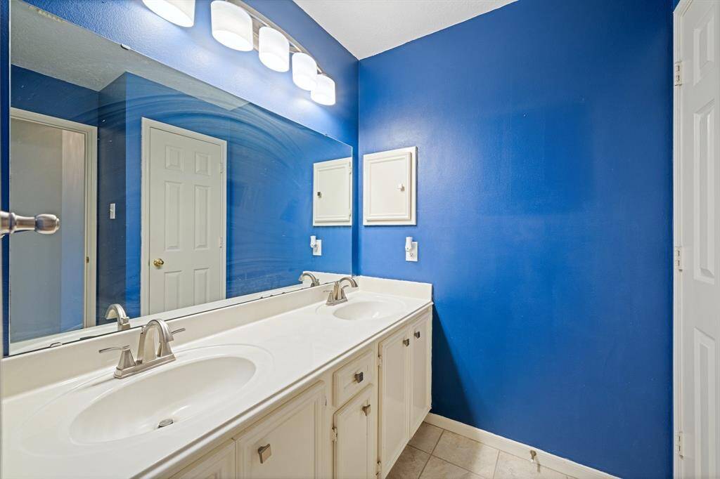 Full bathroom shared by the secondary bedrooms.