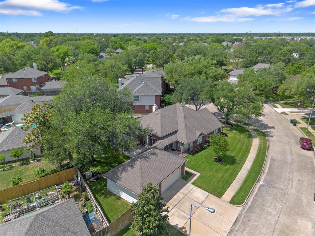 Ariel view of the home.  8823 Willacy is the home on the corner of the cul-de-sac and street with the side entry garage.