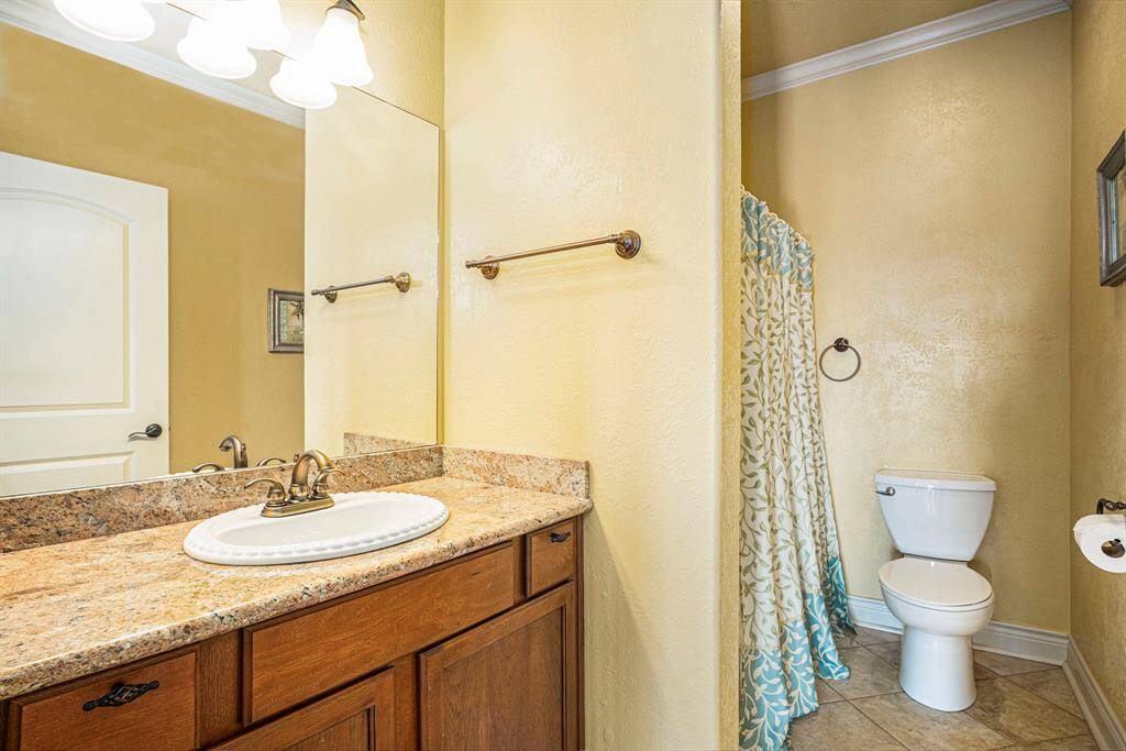 Located at the top of the stairs and thoughtfully positioned between the secondary bedrooms, this full bathroom offers exceptional convenience for the upper level.second