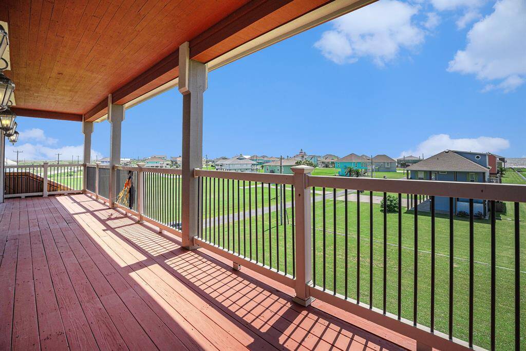 Enjoy breathtaking beach views from the secondary deck, conveniently accessible from all of the secondary bedrooms.