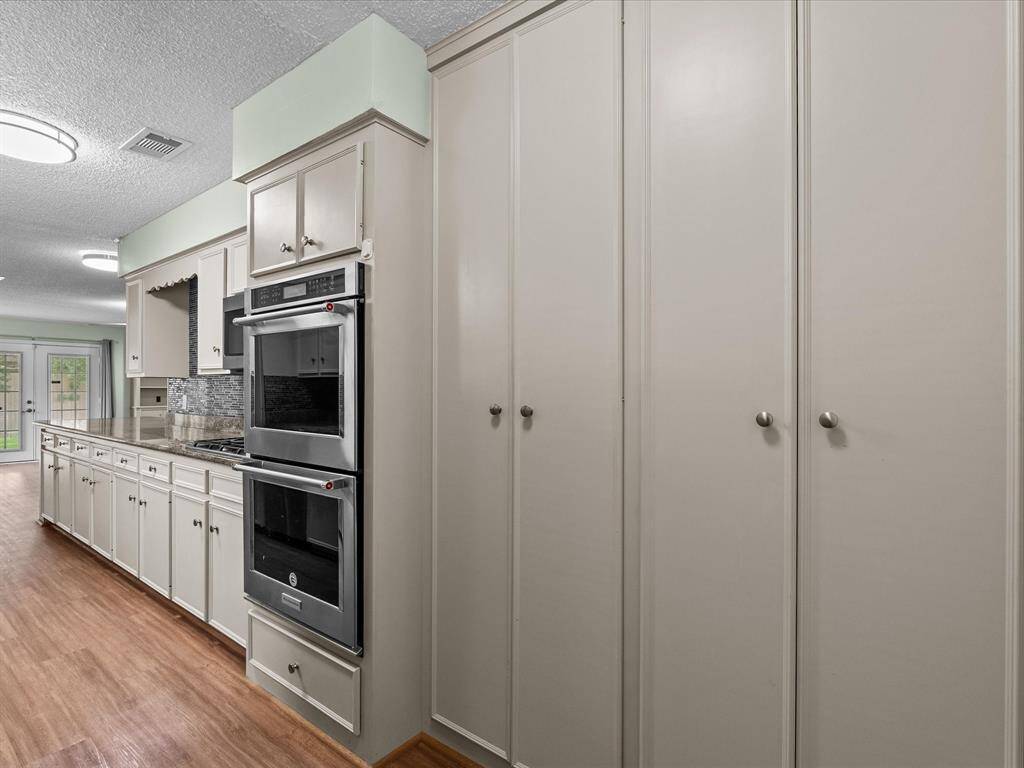 Double pantry and double ovens, make this kitchen a dream!