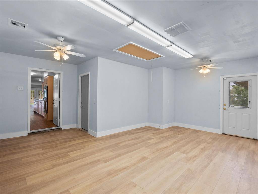 Flex room, recently upgraded with new flooring, moldings, lighting, and central A/C and Heat. This room is also easily adaptable for a 4th bedroom, game room, etc.