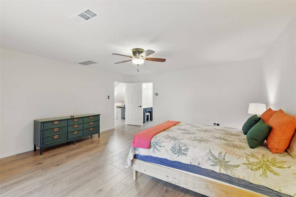 Another view of the primary bedroom.