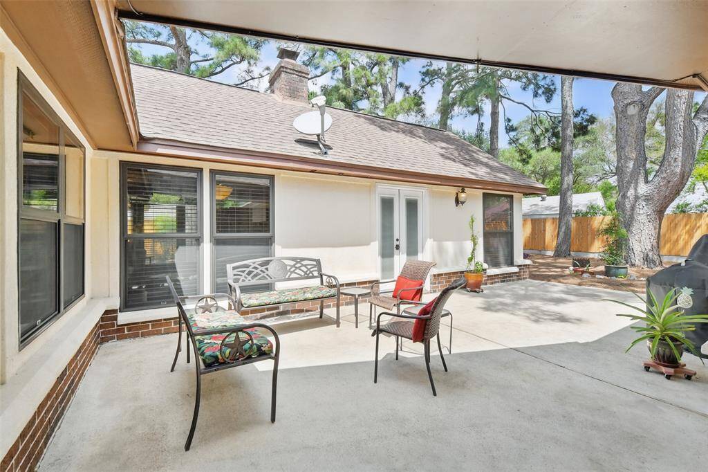 The backyard patio is perfect for entertaining! There is plenty of room for patio furniture.