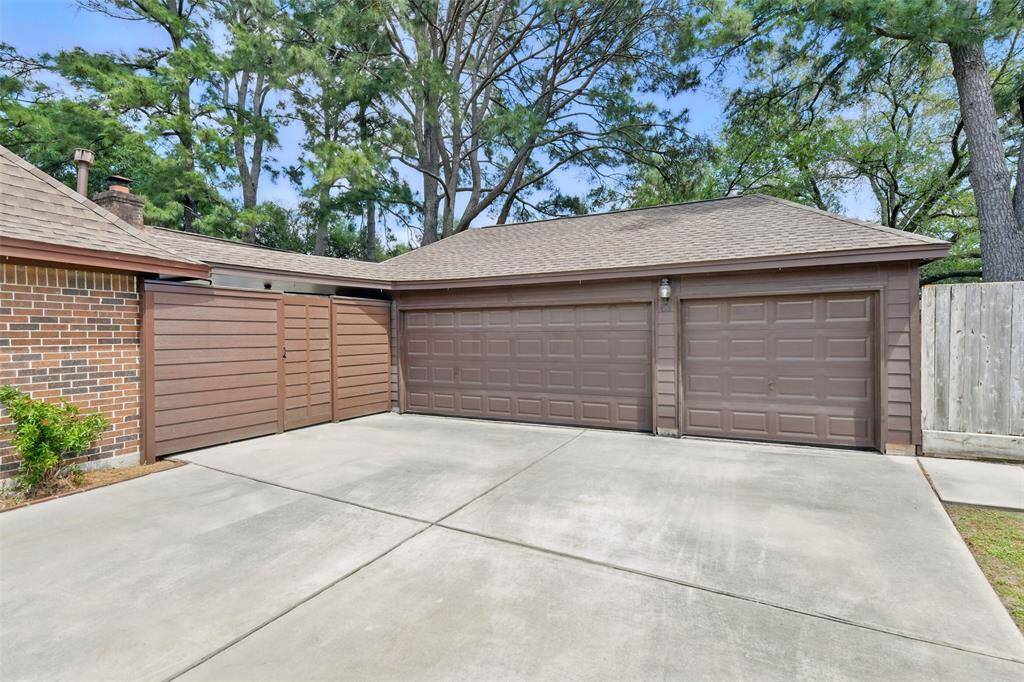 There is a three car garage with an auto garage door opener with plenty of driveway space to park additional vehicles.