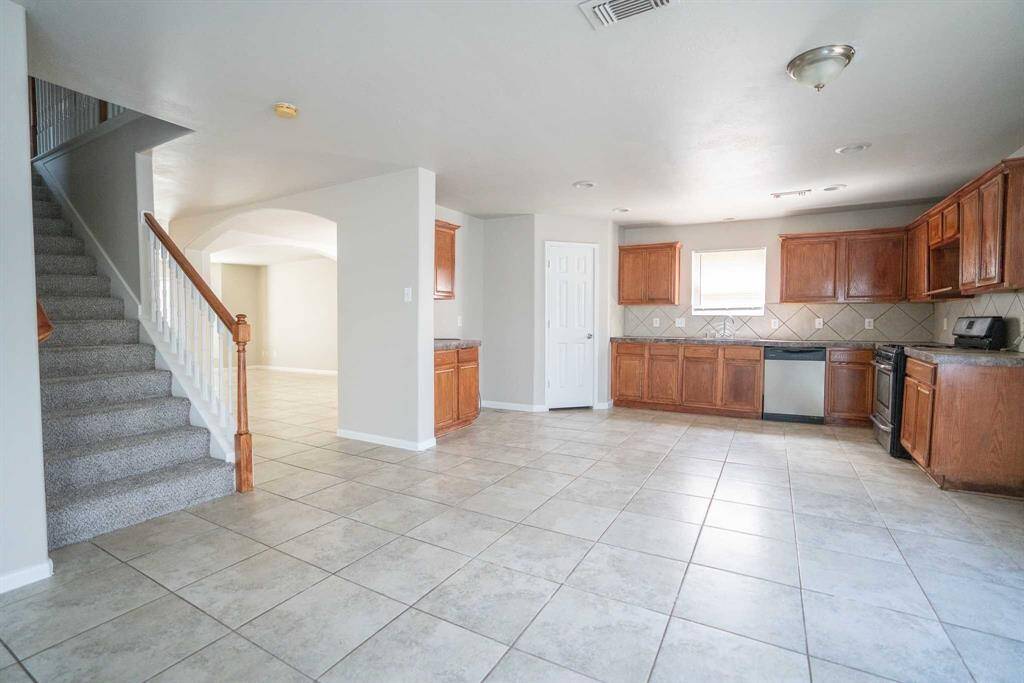 Kitchen & stairway. All bedrooms upstairs